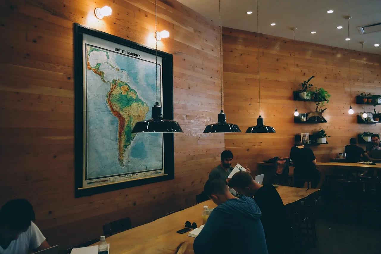 group, people, reading, working, cafe, restaurant, coworking, lights, wood, tables, brown work, brown reading, brown restaurant, brown cafe, brown group, coworking, coworking, coworking, coworking, coworking. Coworking space staffing: from hire to trained
