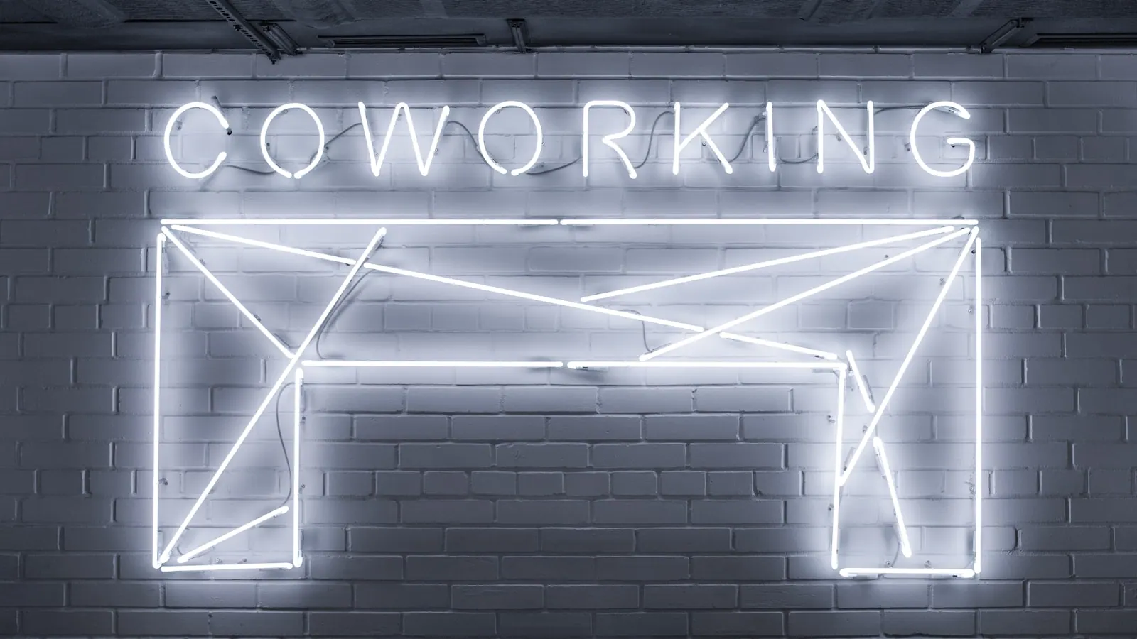 closeup photo of Co Working neon light sign Coworking Neon Sign. Coworking space insurance costs and coverage