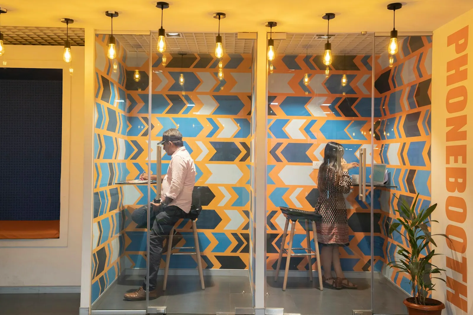 man and woman sitting on bar stools Smartworks has a strategically located coworking space in Kolkata for companies looking for office space for rent. Our expertise lies in creatin. Coworking space lease costs and site requirements