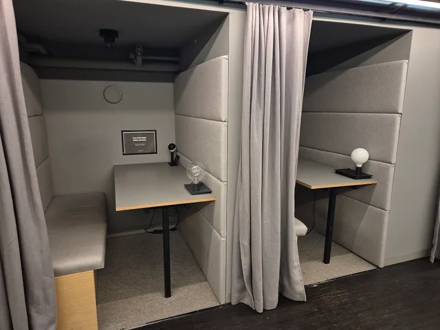An example of coworking phone booth space in Stockholm, Sweden. This photo is taken in 2026 by a smart phone. Coworking space noise policy examples that members actually follow