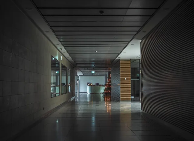 architecture, corridor, hallway, perspective, building, light, office, doors, sliding doors, office building, window, glass, modern, property, inner space, corridor, corridor, hallway, hallway, hallway, hallway, hallway. How coworking space prices are built, and where the margin hides