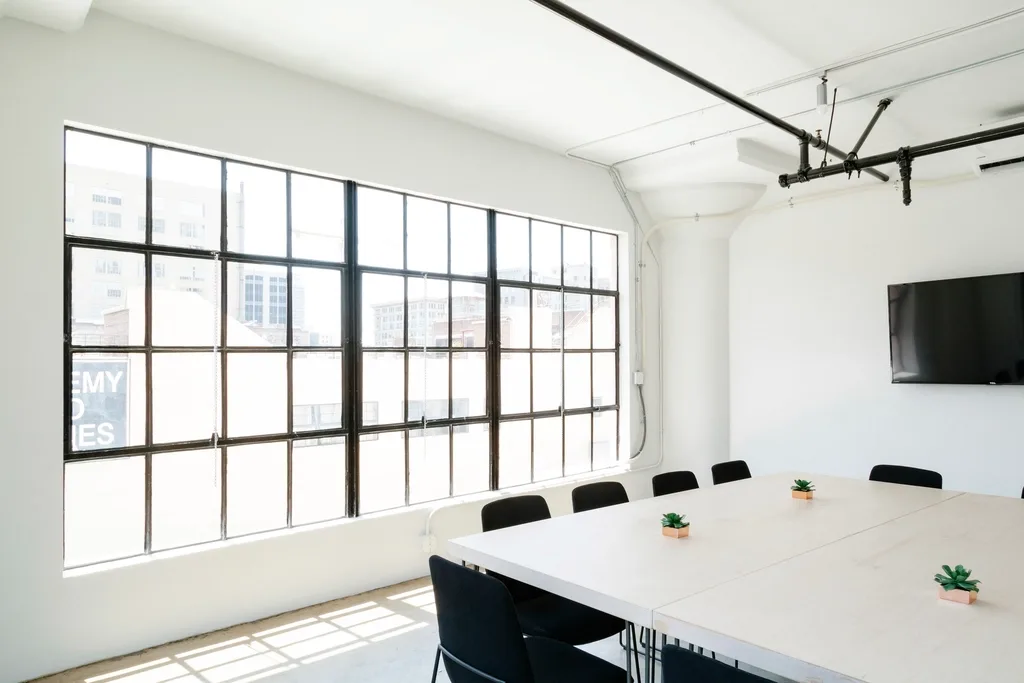 empty conference room square table. How to start coworking space operations: launch checks