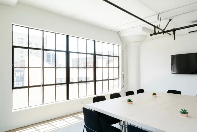 empty conference room square table. How to start coworking space operations: launch checks